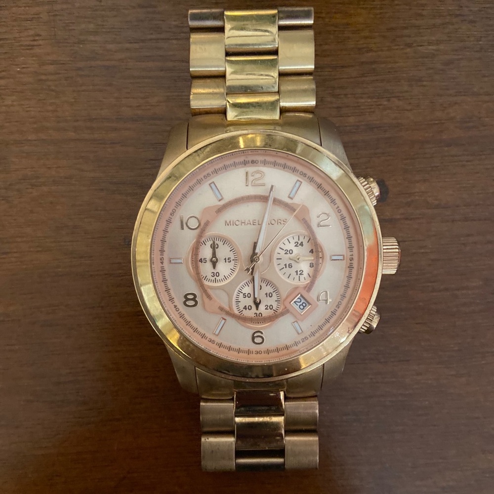 Michael Kors oversized rose gold watch.